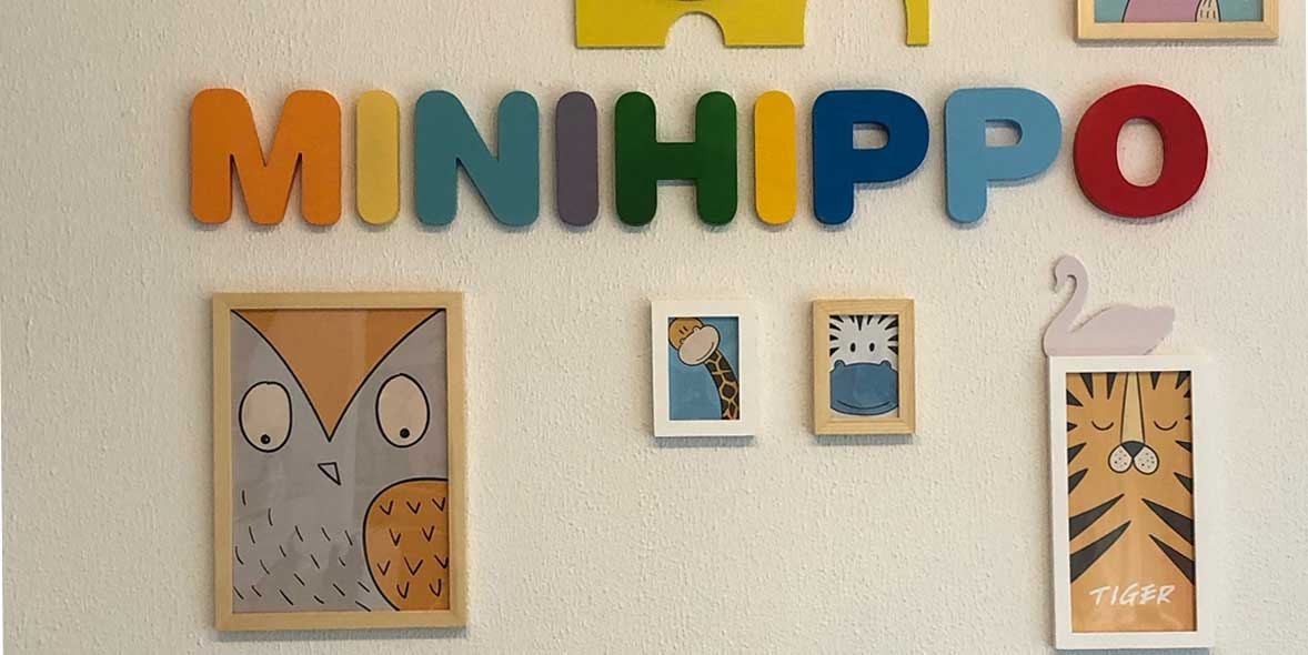 MiniHippo Baby Stores achtergrond