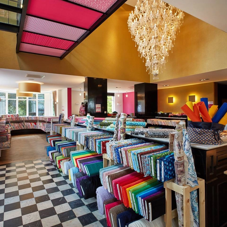 De Stoffenstraat arrière plan