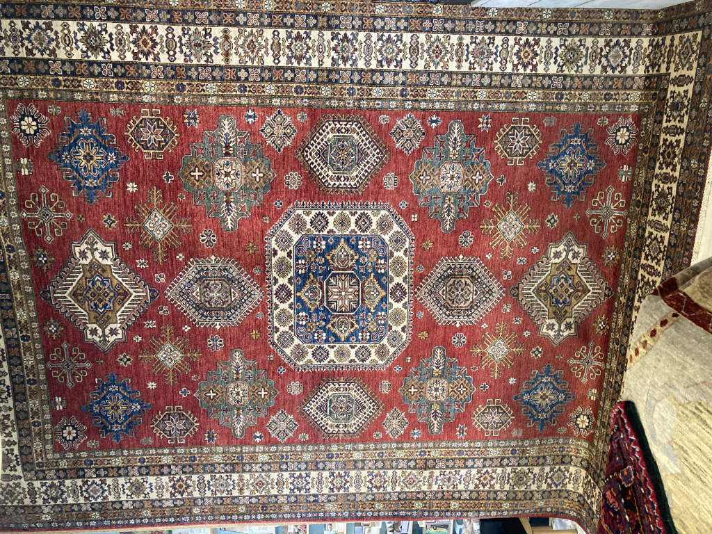 Tapijtenhuiss achtergrond