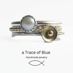 Logo van a Trace of Blue